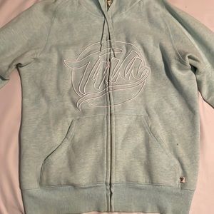 This sweater is a beautiful kind of light teal colour!